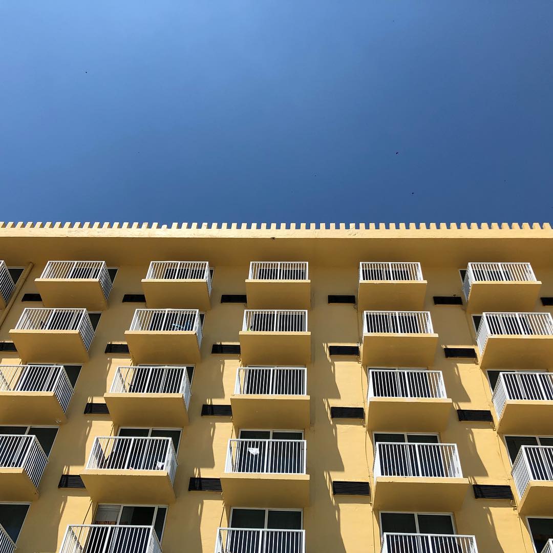 Golden hotel. Blue sky.